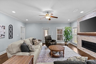 Tucked inside the Village of Highlands South, this 4-bedroom