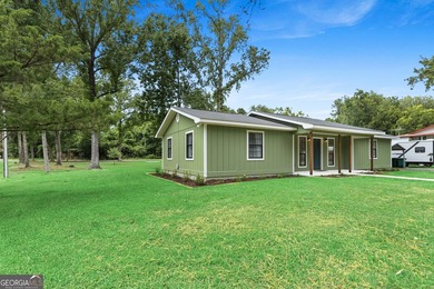 Beautifully remodeled and move-in ready, this 3-bedroom, 2-bath - photo 29