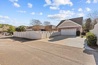 Tucked inside the Village of Highlands South, this 4-bedroom