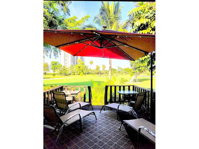 ?In the heart of Aventura, this two story townhome *treehouse*