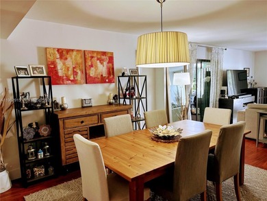 ?In the heart of Aventura, this two story townhome *treehouse*