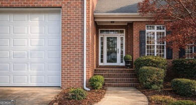 Welcome home to this beautifully maintained townhome nestled on - photo 1