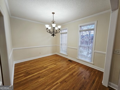 Welcome home to this beautifully maintained townhome nestled on - photo 5