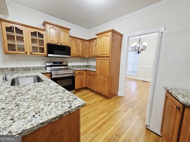 Welcome home to this beautifully maintained townhome nestled on - photo 7