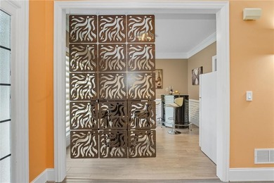 Privately located on a quiet cul-de-sac, this beautifully