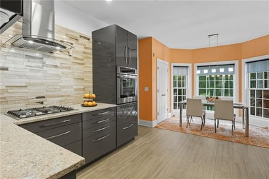 Privately located on a quiet cul-de-sac, this beautifully