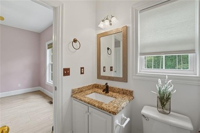 Privately located on a quiet cul-de-sac, this beautifully