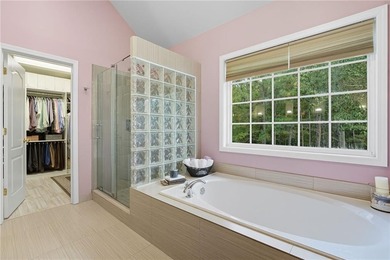 Privately located on a quiet cul-de-sac, this beautifully