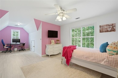 Privately located on a quiet cul-de-sac, this beautifully