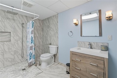 Privately located on a quiet cul-de-sac, this beautifully