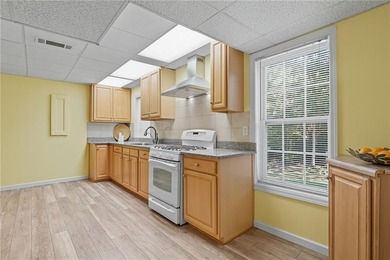 Privately located on a quiet cul-de-sac, this beautifully