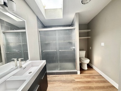 3 bedrooms, 2 remodeled bathrooms, fresh pained laminate - photo 8