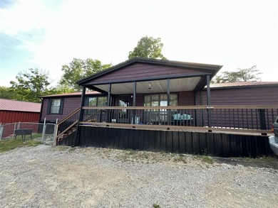 Lake view home on Nolin Lake featuring a boat slip and plenty of - photo 1