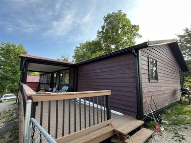 Lake view home on Nolin Lake featuring a boat slip and plenty of - photo 2