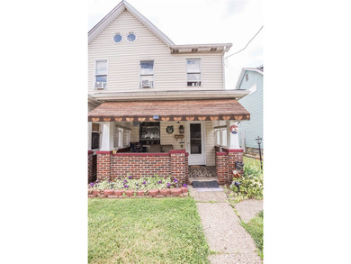 Welcome to 526 4th Ave, Ford City! This 2-bedroom, 2-bath home - photo 1