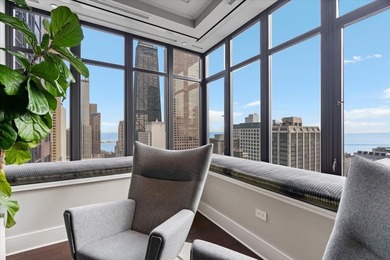 Set within the prestigious Ritz-Carlton Residences Chicago along - photo 11