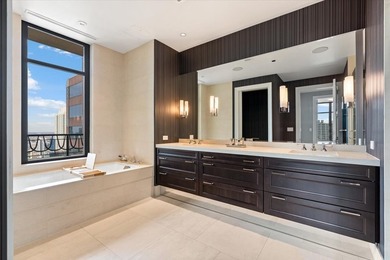 Set within the prestigious Ritz-Carlton Residences Chicago along - photo 24