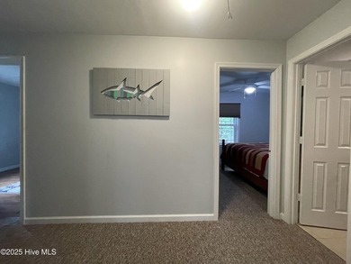 This charming brick bungalow in the harbor town of Belhaven - photo 12