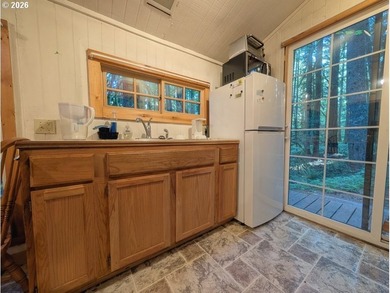 Built in 1930 and tucked among towering firs in the Mt. Hood - photo 19