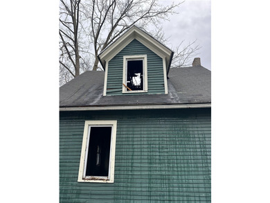 Great value-add DUPLEX opportunity! Property sustained a house - photo 4