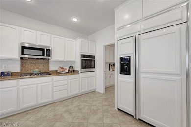 Sun City Anthem golf course frontage! This light-filled, open