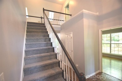 Improved pricing! Welcome to this 1.5-story home offering both - photo 4