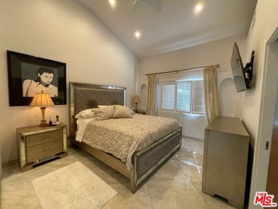 Welcome to a captivating coastal Mediterranean-style retreat in - photo 9