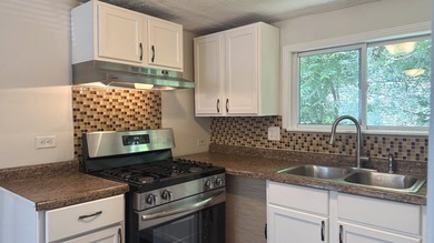 Enjoy the perfect blend of privacy and lake-area living in this - photo 11