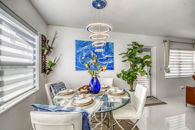 Beautifully remodeled 2BR/1.5BA upstairs corner condo with water - photo 4