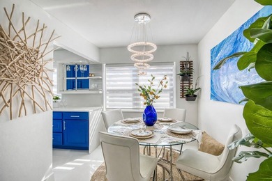 Beautifully remodeled 2BR/1.5BA upstairs corner condo with water - photo 5
