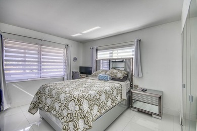 Beautifully remodeled 2BR/1.5BA upstairs corner condo with water - photo 7