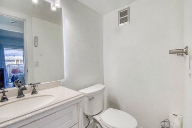 Beautifully remodeled 2BR/1.5BA upstairs corner condo with water - photo 10