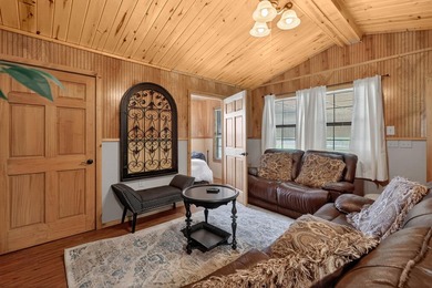 Experience refined waterfront living in the gated community of - photo 5