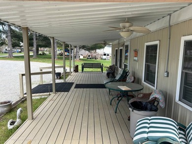 MOBILE HOME W/ ADDITION-STORAGE BLDGS. - NEAR HOLMES BEND MARINA - photo 11