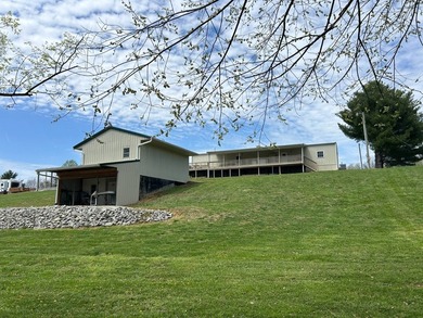 MOBILE HOME W/ ADDITION-STORAGE BLDGS. - NEAR HOLMES BEND MARINA - photo 49