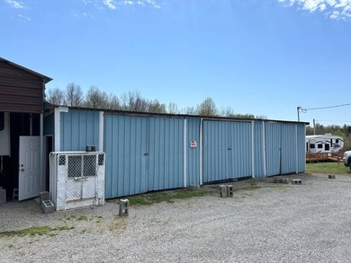 MOBILE HOME W/ ADDITION-STORAGE BLDGS. - NEAR HOLMES BEND MARINA - photo 50