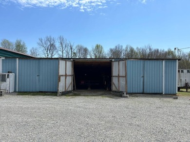 MOBILE HOME W/ ADDITION-STORAGE BLDGS. - NEAR HOLMES BEND MARINA - photo 53