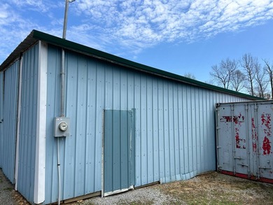 MOBILE HOME W/ ADDITION-STORAGE BLDGS. - NEAR HOLMES BEND MARINA - photo 58