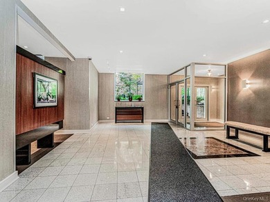 Welcome home to this bright and inviting top-floor one-bedroom - photo 11
