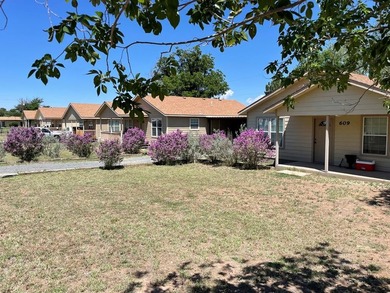 INVESTORS! THIS multi-family (5 unit) property, on almost an - photo 1