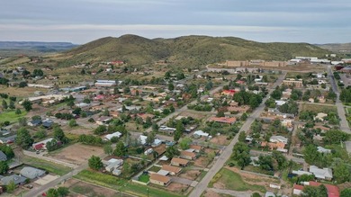 INVESTORS! THIS multi-family (5 unit) property, on almost an - photo 2