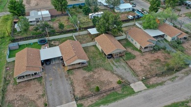 INVESTORS! THIS multi-family (5 unit) property, on almost an - photo 3