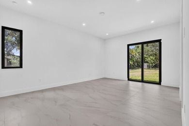 Welcome to this 2026 modern residence, nestled on a private - photo 32