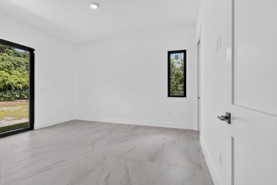 Welcome to this 2026 modern residence, nestled on a private - photo 39