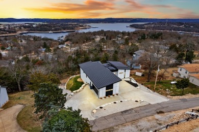 Majestically occupying one of Table Rock's most sought after SOLD - Lake Home SOLD! in Kimberling City, Missouri