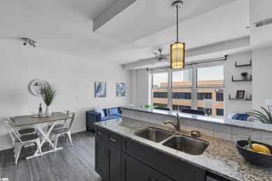 You CAN live just one block off Main Street in the heart of