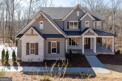 Lake Home For Sale in Flowery Branch, Georgia