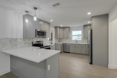 Completely renovated from top to bottom, this move-in ready home - photo 11