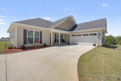 Welcome home to easy living and resort-style amenities in this - photo 2