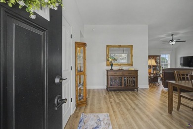Welcome home to easy living and resort-style amenities in this - photo 6